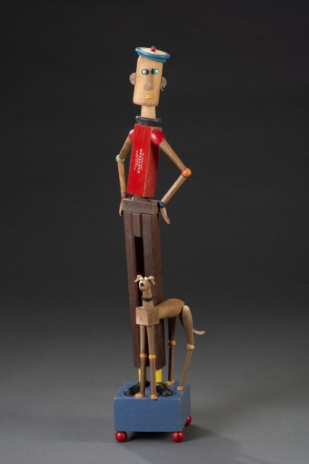 A Defiant Man and His Dog [Carpenter's Level, Tool Handles, Kitchen Pounder, Yo-Yo]